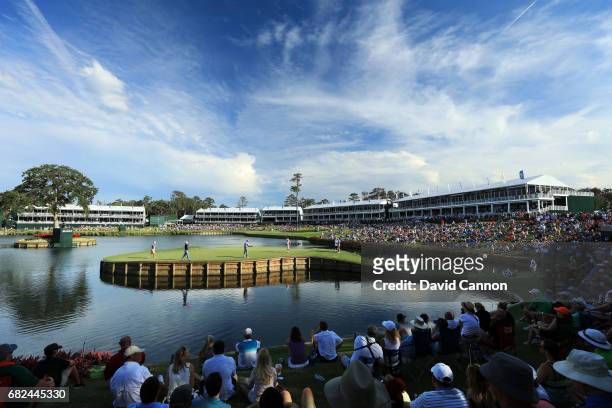 Vijay Singh of Fiji just misses a birdie putt on the par 3, 17th hole during the second round of THE PLAYERS Championship on the Stadium Course at...