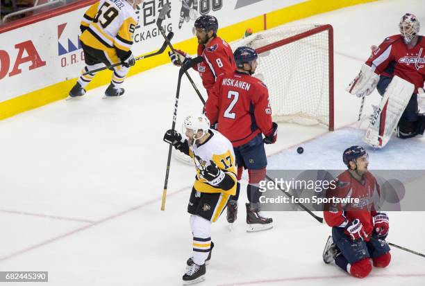 Pittsburgh Penguins right wing Bryan Rust celebrates after scoring the first goal during game 7 of the Stanley Cup Eastern Conference semifinal...