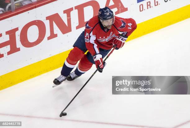 Washington Capitals right wing Justin Williams brings the puck up ice during game 7 of the Stanley Cup Eastern Conference semifinal between the...