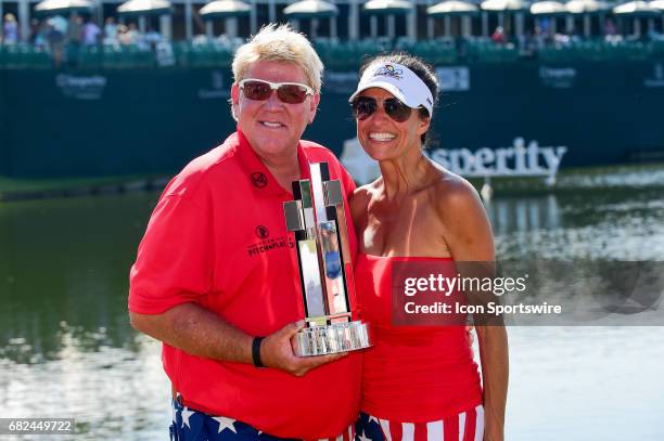 John Daly and his girlfriend, Anna Cladakis with the trophy for winning the Insperity Invitational on May 07, 2017 at The Woodlands Country Club, The...