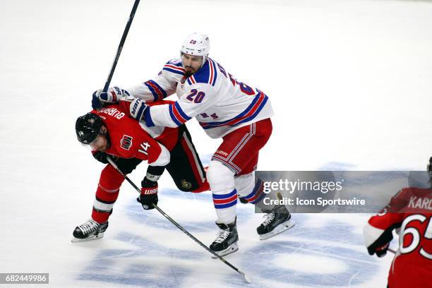 New York Rangers Left Wing Chris Kreider shoves Ottawa Senators Right Wing Alexandre Burrows during the first period of Game 5 of the 2nd round of...