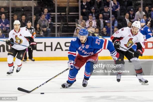 New York Rangers defenseman Ryan McDonagh chases down the puck in the neutral zone during the third period of game 4 of the second round of the 2017...