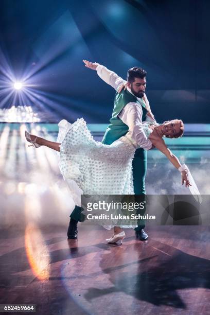 Faisal Kawusi and Oana Nechiti perfom on stage during the 8th show of the tenth season of the television competition 'Let's Dance' on May 12, 2017 in...