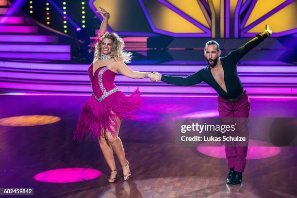 Angelina Kirsch and Massimo Sinato perfom on stage during the 8th show of the tenth season of the television competition 'Let's Dance' on May 12,...