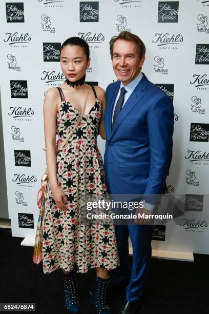 Angel Zheng and Jeff Koons attend the Kiehl's Since 1851, Art Production Fund and Saks Fifth Avenue Celebrate the Unveiling of "Seated Ballerina" by...