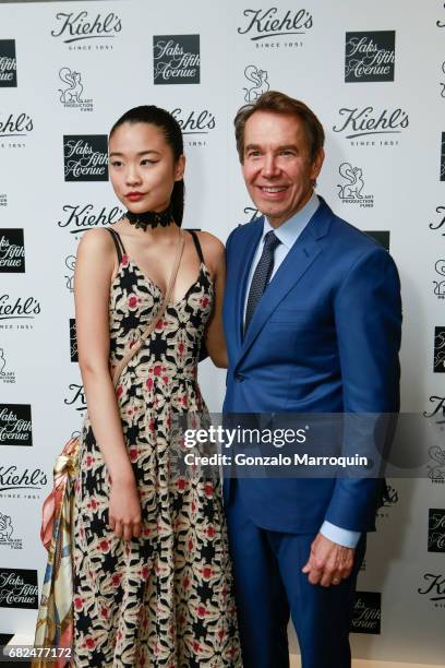 Angel Zheng and Jeff Koons attend the Kiehl's Since 1851, Art Production Fund and Saks Fifth Avenue Celebrate the Unveiling of "Seated Ballerina" by...