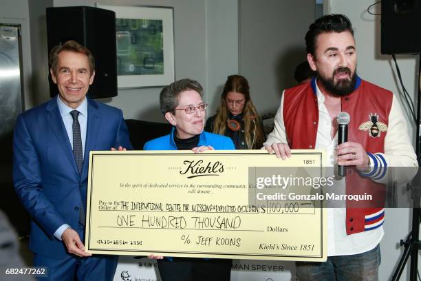 Jeff Koons, Maura Harty, Chris Salgardo attend the Kiehl's Since 1851, Art Production Fund and Saks Fifth Avenue Celebrate the Unveiling of "Seated...