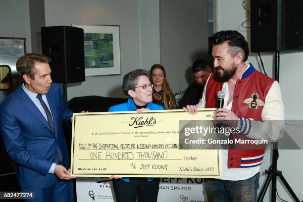 Jeff Koons, Maura Harty, Chris Salgardo attend the Kiehl's Since 1851, Art Production Fund and Saks Fifth Avenue Celebrate the Unveiling of "Seated...