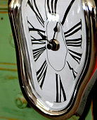 Dali style clock with roman numerals