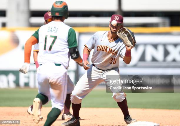 Bethune infielder Danny Rodriguez takes the throw during a college baseball game between the Bethune-Cookman University Wildcats and the University...