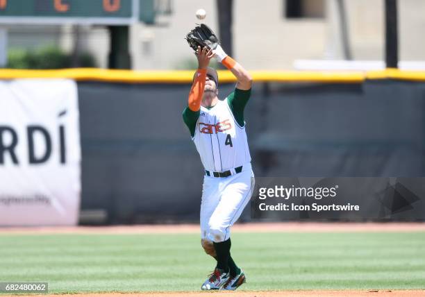 Miami infielder Johnny Ruiz catches a pop up during a college baseball game between the Bethune-Cookman University Wildcats and the University of...