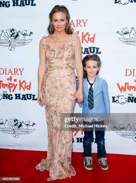 Alicia Silverstone and her son Bear Blu Jarecki appear at the premiere of Diary of a Wimpy Kid The Long Haul at the Indianapolis Motor Speedway on...