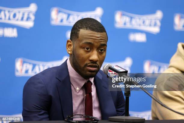 John Wall of the Washington Wizards talks with the press after the game against the Boston Celtics during Game Six of the Eastern Conference...