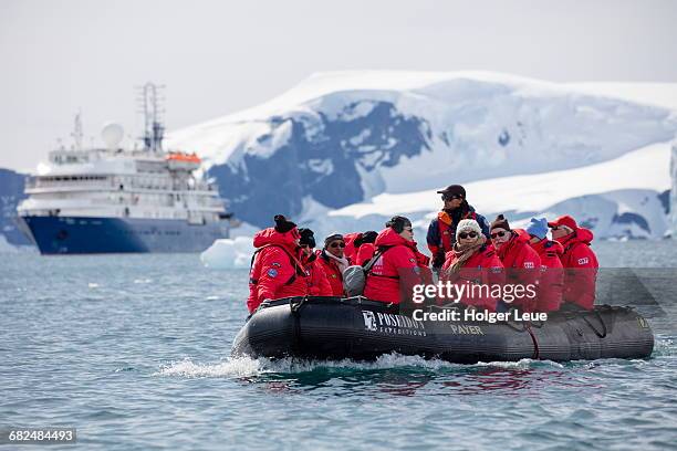 cruise ship mv sea spirit zodiac raft excursion - antarctica people stock pictures, royalty-free photos & images