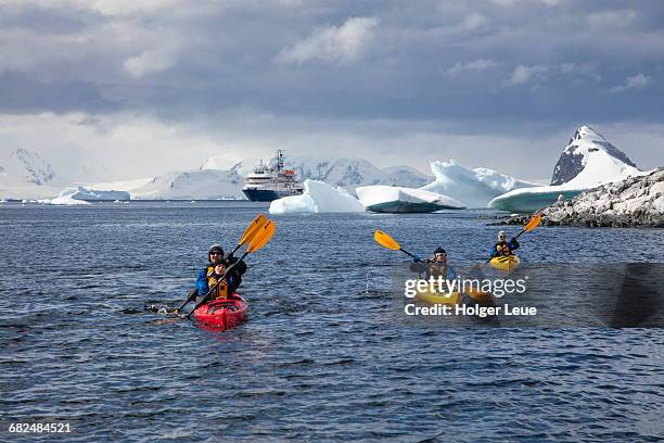 cruise ship mv sea spirit sea kayak excursion - antarctica people stock pictures, royalty-free photos & images