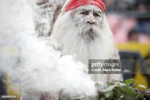 Indigenous performers prepare for a indigenous smoking ceremony ahead of the NRL Indigenous Round 10 NRL match between the St George Illawarra...