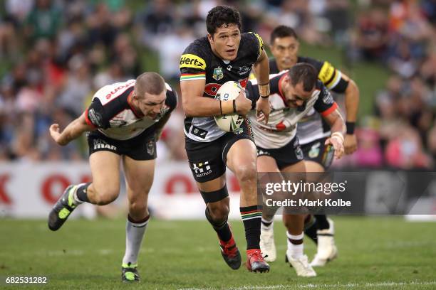 Dallin Watene-Zelezniak of the Panthers makes a break during the round 10 NRL match between the Penrith Panthers and the New Zealand Warriors at...