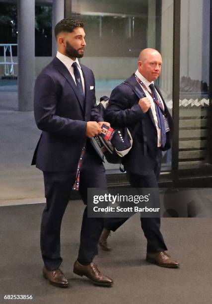 Colby Fainga'a of the Rebels and Melbourne Rebels head coach Tony McGahan arrive before the round 12 Super Rugby match between the Melbourne Rebels...