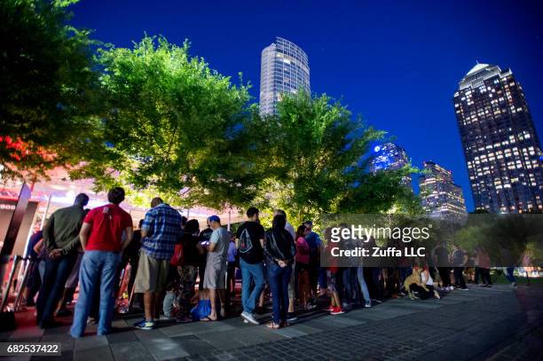 Fans line up outside during the UFC 211 Kingdom Pre-Party at Savor Gastropub on May 12, 2017 in Dallas, Texas.