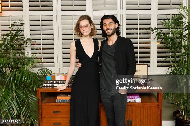 Monika Jagaciak and Giampiero Tagliaferri attend Oliver Peoples 30th Anniversary Party on May 12, 2017 in Los Angeles, California.