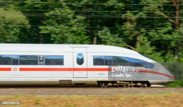 ice high speed train driving fast - sjoerd van der wal or sjo stock pictures, royalty-free photos & images