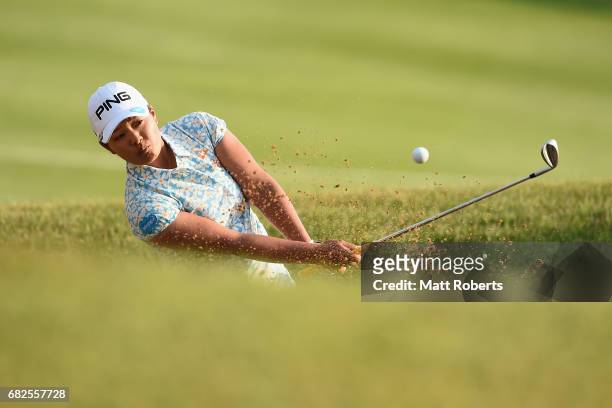 Ai Suzuki of Japan hits out of the 18th green bunker for a birdie during the second round of the Hoken-no-Madoguchi Ladies at the Fukuoka Country...