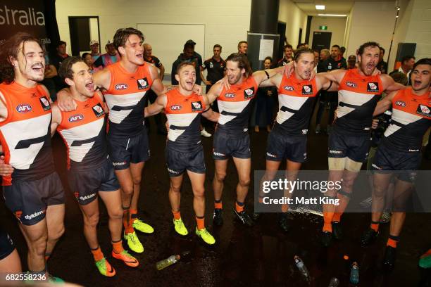 Giants celebrate victory and sing the team song after the round eight AFL match between the Greater Western Sydney Giants and the Collingwood Magpies...