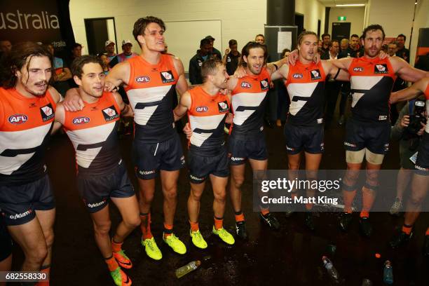 Giants celebrate victory and sing the team song after the round eight AFL match between the Greater Western Sydney Giants and the Collingwood Magpies...