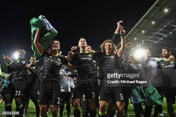 Cesar Azpilicueta, Gary Cahill and David Luiz celebrate winning the league after the Premier League match between West Bromwich Albion and Chelsea at...