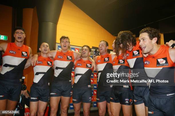 Giants players sing the club song after victory in the round eight AFL match between the Greater Western Sydney Giants and the Collingwood Magpies at...