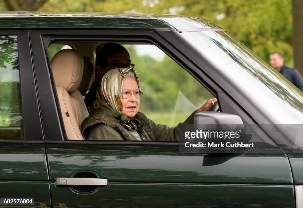 Queen Elizabeth II driving her Range Rover around the Windsor Horse Show on May 13, 2017 in Windsor, England.