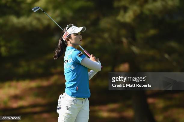 Yuting Seki of China watches her approach shot on the 4th hole during the second round of the Hoken-no-Madoguchi Ladies at the Fukuoka Country Club...