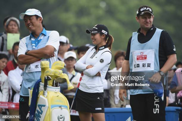 Ayaka Matsumori of Japan shares a laugh before her tee shot on the 10th hole during the first round of the Hoken-no-Madoguchi Ladies at the Fukuoka...