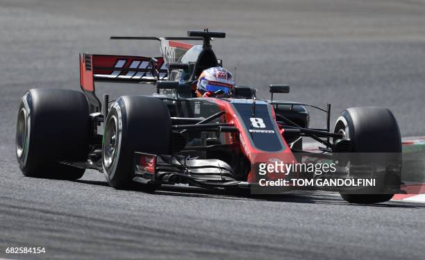 Haas F1's French driver Romain Grosjean drives during the third practice session at the Circuit de Catalunya on May 13, 2017 in Montmelo on the...