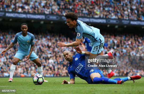 Leroy Sane of Manchester City is fouled by Yohan Benalouane of Leicester City and a penalty is awarded to Manchester City during the Premier League...