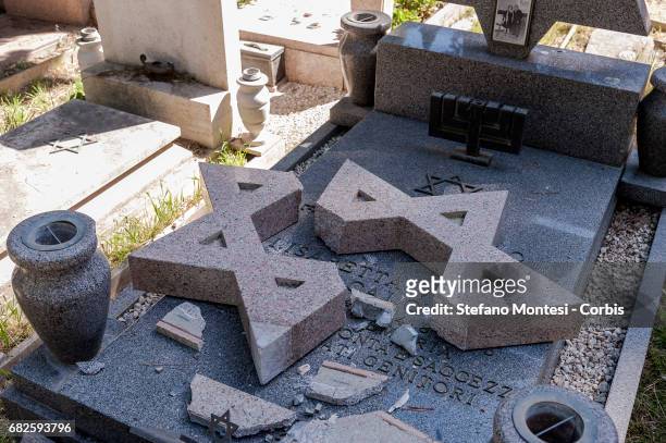 View of Jewish and Catholic graves and tombstones vandalised at Rome's historic Verano cemetery on May 13, 2017 in Rome, Italy. Approximately 70...