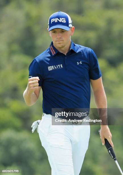 Matt Wallace of England celebrates after saving his par on the 1st hole during day three of the Open de Portugal at Morgado Golf Resort on May 13,...