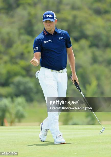 Matt Wallace of England celebrates after saving his par on the 1st hole during day three of the Open de Portugal at Morgado Golf Resort on May 13,...