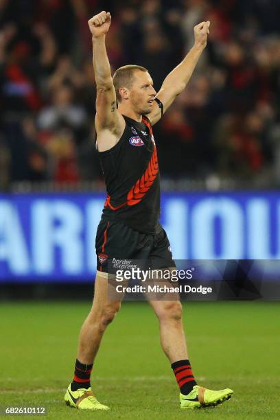 James Kelly of the Bombers celebrates the win on the final siren in his 300th match during the round eight AFL match between the Essendon Bombers and...
