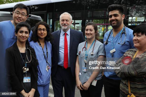 Labour Leader Jeremy Corbyn poses with nurses during a campaign event outside the James Paget Hospital on May 2017 in Great Yarmouth, England.