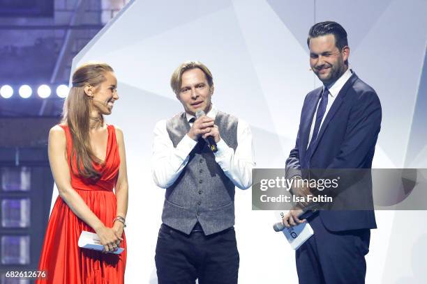 German presenter Annamarie Carpendale, Clark Datchler and german presenter Matthias Killing during the GreenTec Awards Show at ewerk on May 12, 2017...
