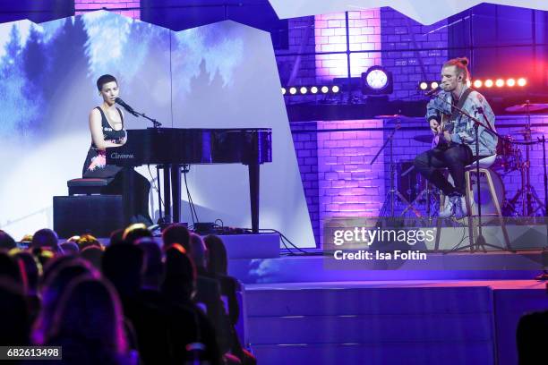 Alina Sueggeler and Andi Weizel of the band 'Frida Gold' perform at the GreenTec Awards Show at ewerk on May 12, 2017 in Berlin, Germany.