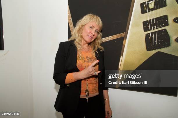 Lisa S. Johnson attends the Malibu Guitar Festival Gallery Opening Reception at Malibu Village on May 12, 2017 in Malibu, California.