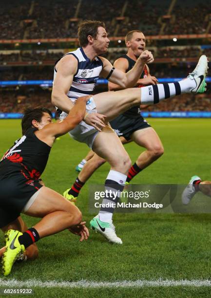 Patrick Dangerfield of the Cats kicks the ball during the round eight AFL match between the Essendon Bombers and the Geelong Cats at Melbourne...