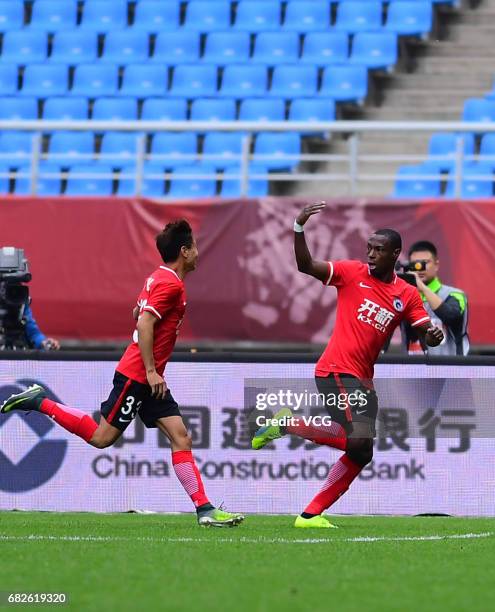 Anthony Ujah of Liaoning Whowin celebrates a point during the 9th round match of 2017 Chinese Football Association Super League between Liaoning...
