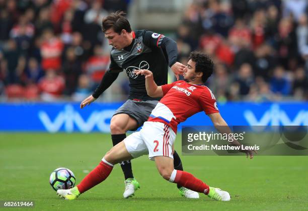 Pierre-Emile Hojbjerg of Southampton and Fabio Da Silva of Middlesbrough battle for possession during the Premier League match between Middlesbrough...