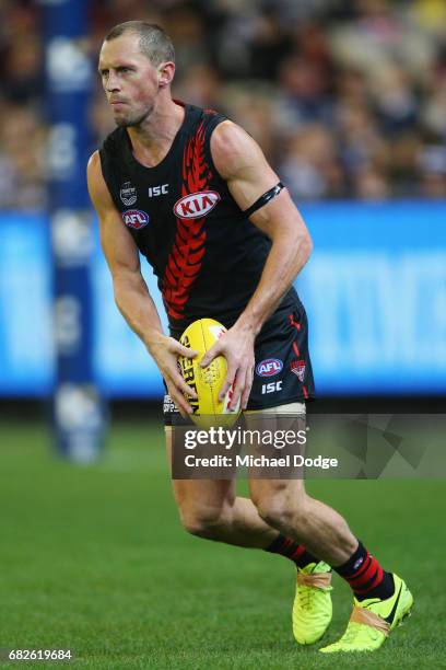 James Kelly of the Bombers looks upfield during the round eight AFL match between the Essendon Bombers and the Geelong Cats at Melbourne Cricket...