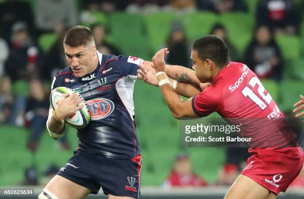 Sean McMahon of the Rebels runs with the ball during the round 12 Super Rugby match between the Melbourne Rebels and the Queensland Reds at AAMI Park...