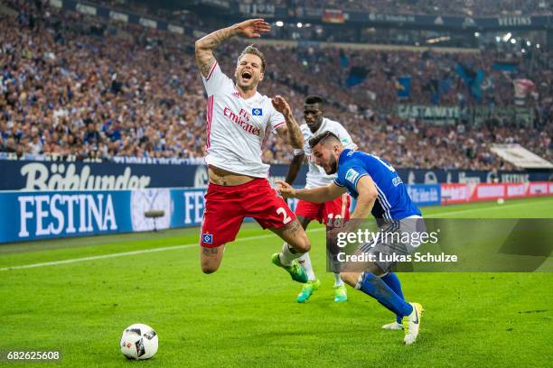 Dennis Diekmeier of Hamburg and Sead Kolasinac of Schalke fight for the ball during the Bundesliga match between FC Schalke 04 and Hamburger SV at...