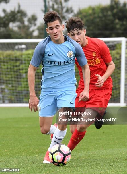Anthony Glennon of Liverpool and Benjamin Sanne of Manchester City in action during the Manchester City v Liverpool U18 Premier League game at Etihad...